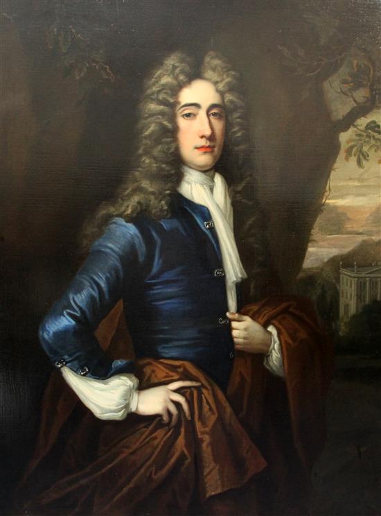 Thomas Gibson (1680-1751) Portrait of a gentleman standing in a landscape, a country house beyond, 50 x 40in.